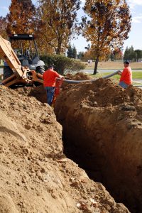 Placing,Pvc,Conduit,For,Fiber,Optic,Data,Cable,In,A